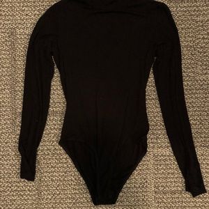 Black mock neck open back bodysuit